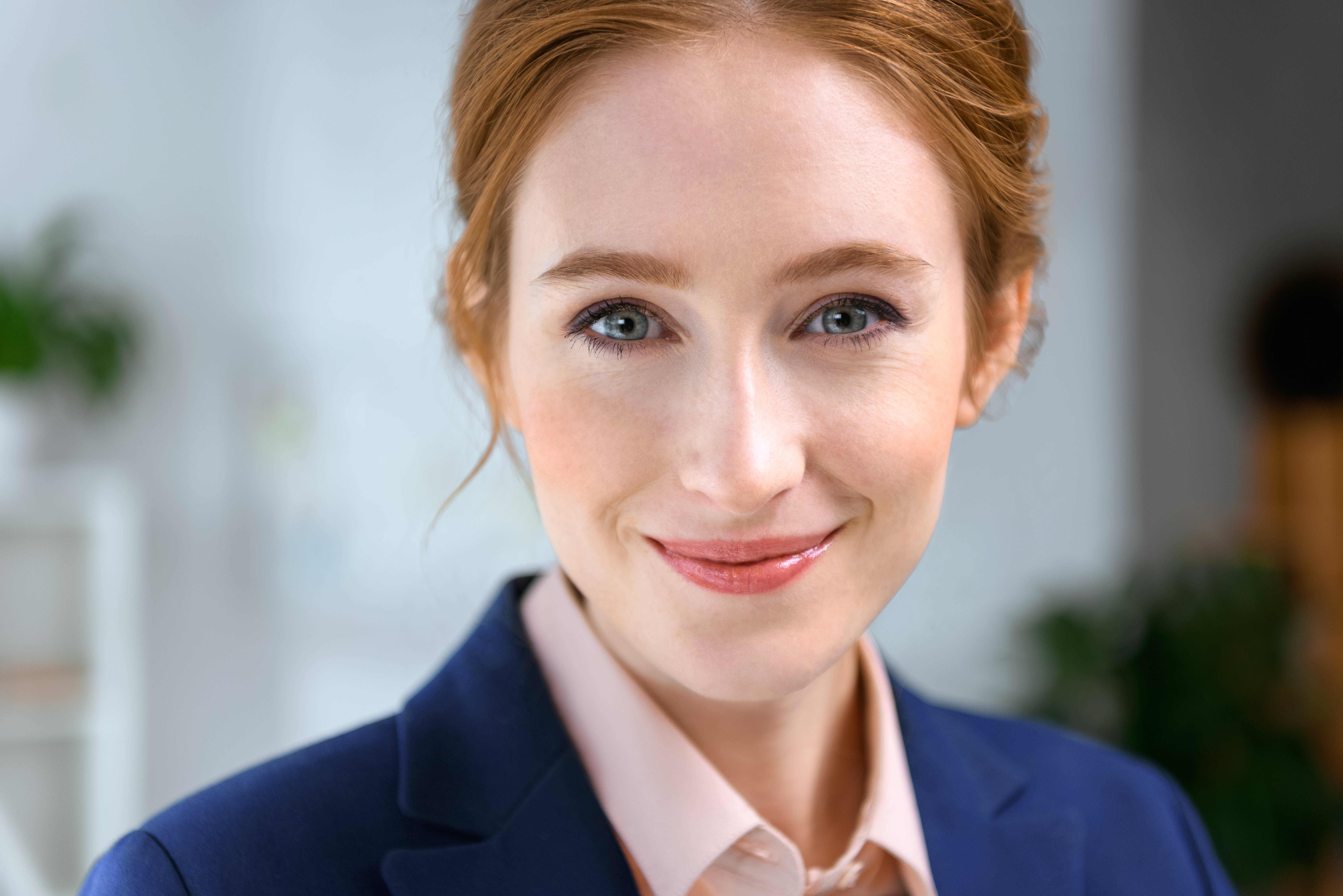 portrait-of-smiling-businesswoman-looking-at-camera